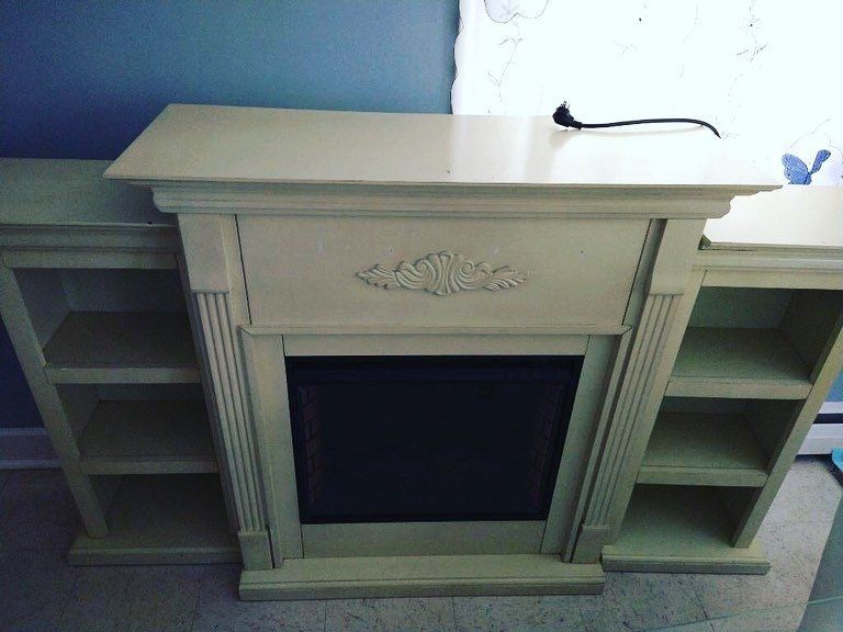 Custom white built-in fireplace and mantel